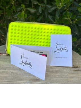 Christian Louboutin Neon Yellow Spike Zip Wallet. Zip long wallet.